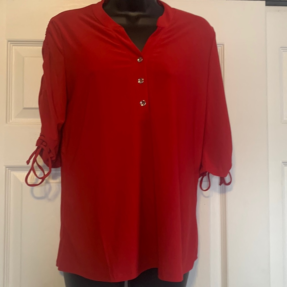 Loose fit top with lace up sleeves